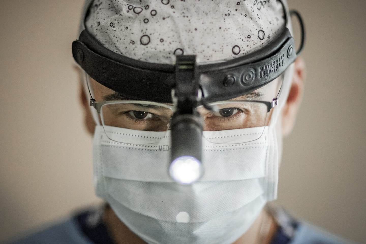 Dr. Christoph Jethon operating on a patient